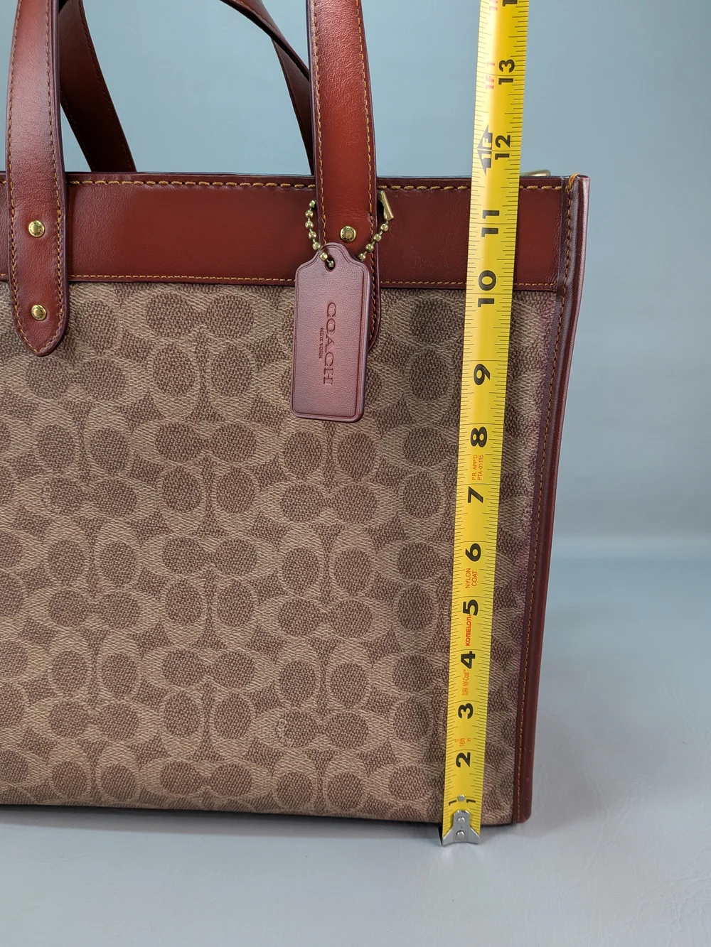 COACH CO766 Tote Truffle Rust Horse Carriage Signature Coated Canvas Leather